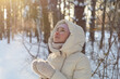 © olegator1977 - Young beautiful woman in winter sunny forest