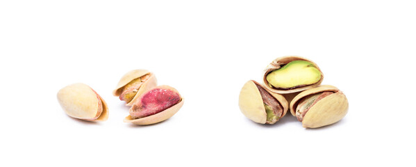 Wall Mural - Pile of fresh pistachios isolated on white background