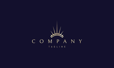 Wall Mural - vector golden logo on which an abstract image of the symbol of the sun in the form of a crown.