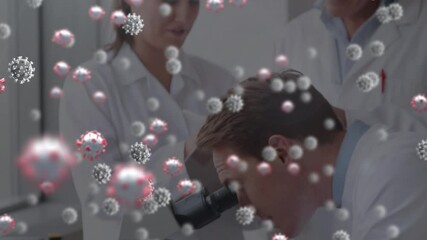 Sticker - Animation of 3d covid 19 cells floating over scientists using microscope