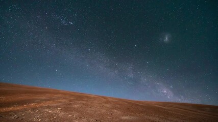 Wall Mural - an amazing view of the milky way rising in atacama desert night sky while the moon sets. an awe view