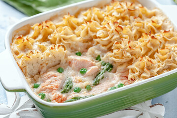 salmon shepherd's pie. Fish in creamy sauce , mashed potatoes and vegetables casserole i