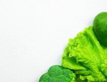Broccoli, Green Lettuce, Avocado On A White Background.