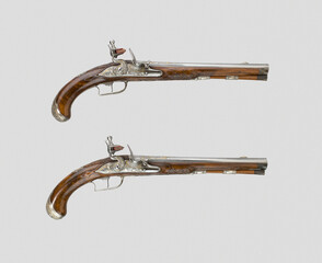 Sticker - Pair of vintage handguns on a white