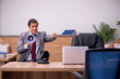 © Elnur - Young businessman employee in bullying concept in the office