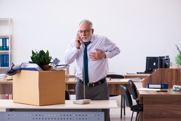 Old male employee being fired from his work