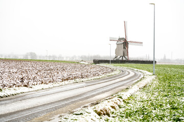 Wall Mural - Windmill whit snow landscape