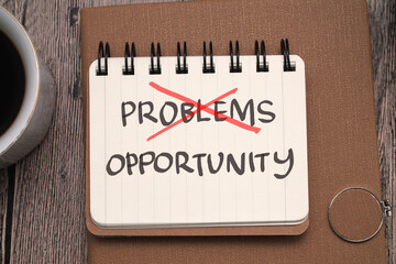 Problems and Opprtunity, text words typography written on paper against wooden background, life and business motivational inspirational