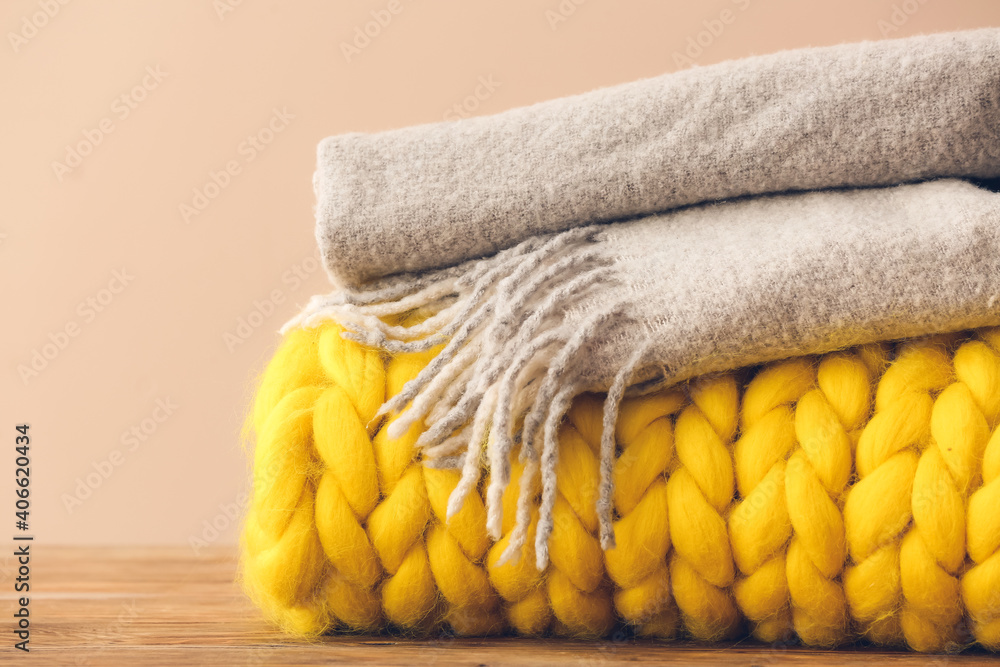 Warm plaids on table, closeup