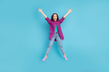 Sticker - Full size portrait of attractive lady jumping star shape open mouth plaid magenta outfit isolated on blue color background