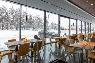 Wall Mural - Interior of a modern mountain restaurant in the winter