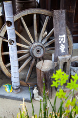 Wall Mural - Old machinery and handcrafted wooden objects in the traditional village of Saiko Iyashi no Sato Nemba in Saiko, Yamanshi, Japan