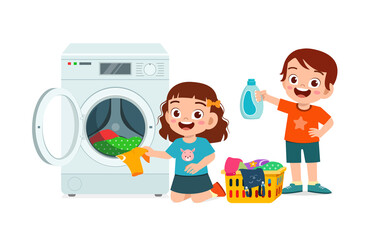 happy cute kid do laundry with washing machine