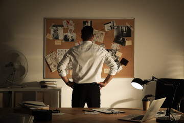 Sticker - Detective looking at evidence board in office