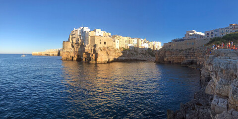 Polignano a Mare Mediterranean sea panorama at sunset, Puglia, Italy