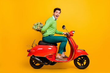 Sticker - Full size profile portrait of funny person sit moped hide flower behind back open mouth isolated on yellow color background