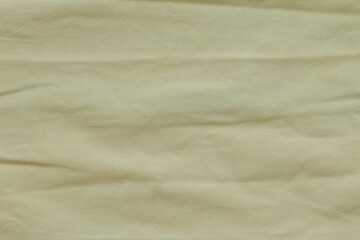 Texture of yellow fabric for clothing.