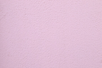 Pink color concrete cement wall background, cement surface texture detail. 