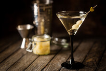 Gibson Alcohol Cocktail With Martini And Onions In Martini Glass. Decorated Cocktail On Dark Background