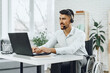 © fotofabrika - Disabled young man businessman working from home