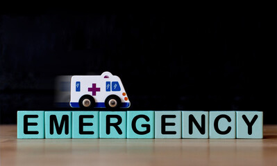 Emergency characters and toy ambulances Concept of emergency patient assistance