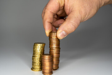 Money, Financial, Business Growth concept, Man's hand put money coins to stack of coins