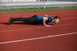 © vpavlyuk - Athlete man doing push ups