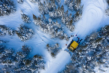 Aerial Drone Photo Of A Group Of Skiers And Snowboarders In A Snow Cat In The Chic Choc Mountains Of Quebec, Canada