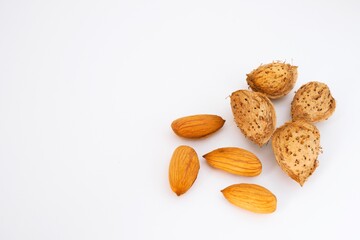 Almond nut in shell and shelled isolated on white background