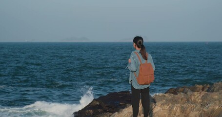 Poster - Woman enjoy the sea from mountain