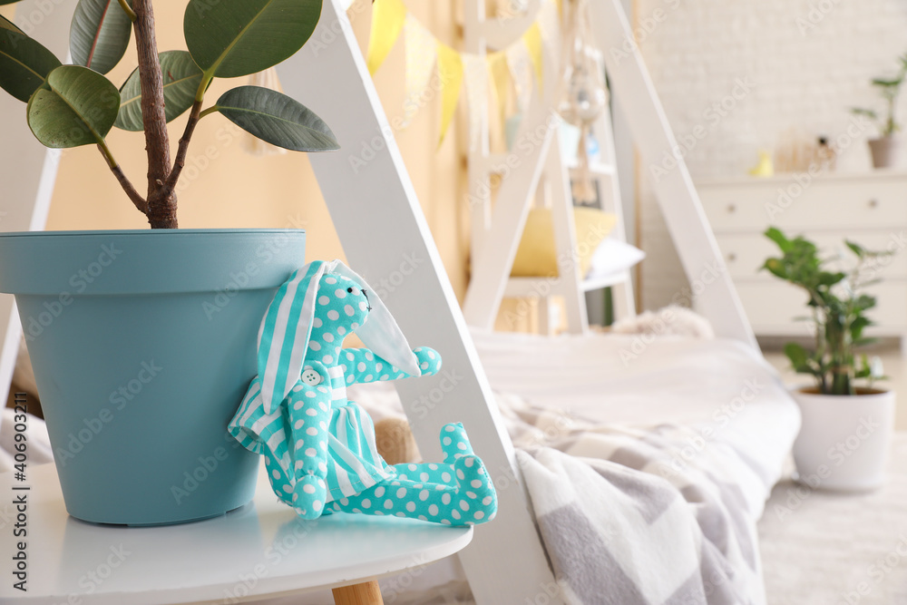 Interior of modern children's room with stylish bed