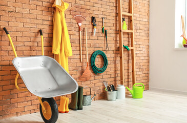 Poster - Different gardening supplies in barn