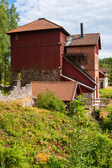 Canvas Print - Old blast furnace building in the countryside