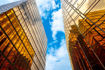 HONG KONG, CHINA - January, 2021 : Golden tall buildings and glass reflections in Hong Kong Island Business concepts of buildings and architecture