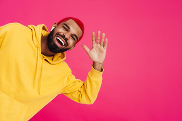 Wall Mural - Happy funky young african wearing a hoodie