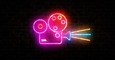 Wall Mural - Cinema projector and camera symbol neon on brick wall