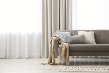 Poster - Modern living room interior with beautiful curtains on window