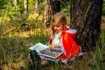 Wall Mural - girl in the forest in red clothes, Little Red Riding Hood, summer, green, park, young, tree, grass, beautiful,   cosplay, path, path, trees, spring, heat, basket, book, wolf