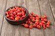 Red pepper pout on a bowl over wooden table