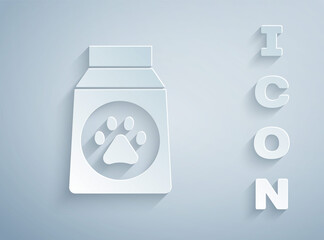 Wall Mural - Paper cut Bag of food for dog icon isolated on grey background. Dog or cat paw print. Food for animals. Pet food package. Paper art style. Vector.