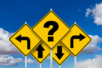 Caution yellow road signs with question mark and arrows