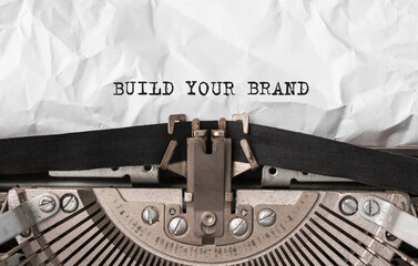 Wall Mural - Text Build Your Brand typed on retro typewriter