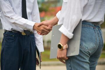 Wall Mural - Men and women shake hands successful business partnership, handshake concept