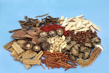 Sticker - Chinese herbs & spice selection used in traditional herbal medicine on mottled blue background. Natural health care concept.