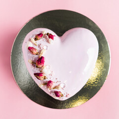 Wall Mural - Cake with berries in the shape of heart on Valentine's Day