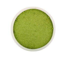 Wall Mural - Top view of green tea powder on white background.