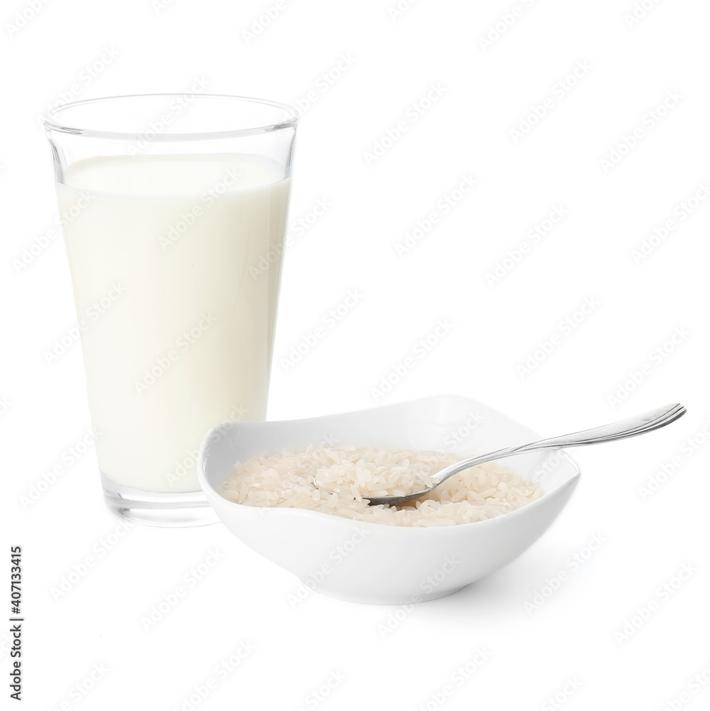 Glass of rice milk on white background