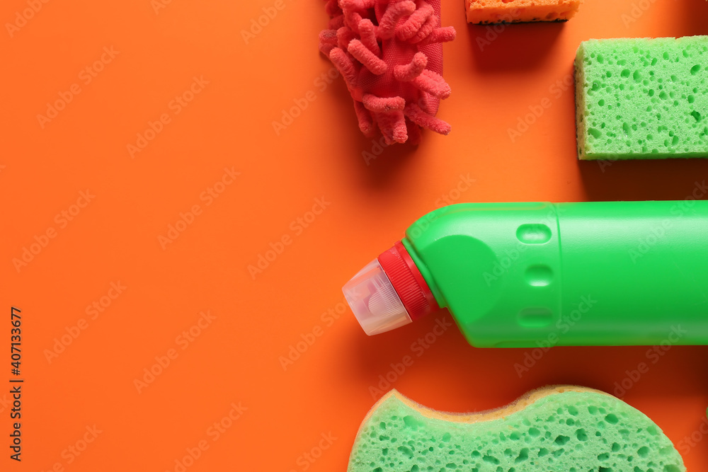 Set of cleaning supplies on color background