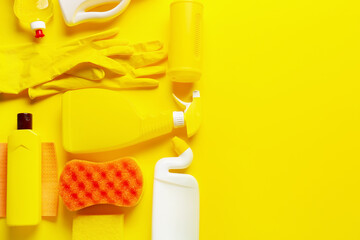 Set of cleaning supplies on color background