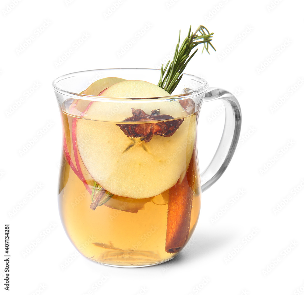 Tasty drink with spices and apple slices in cup on white background